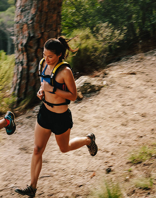 Young couple doing trail running workout