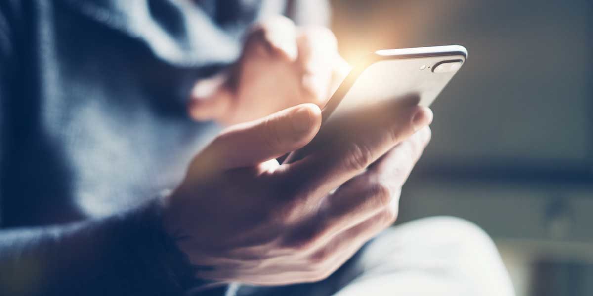 close-up of person holding smartphone