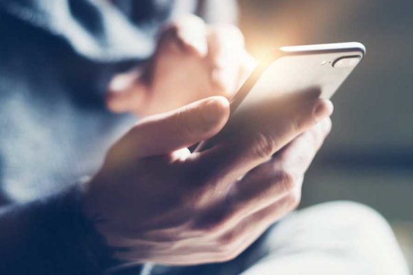 close-up of person holding smartphone